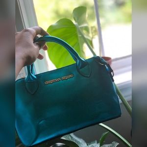 Aqua Christian Siriano purse